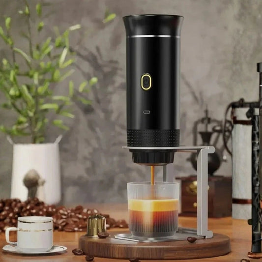 Portable espresso machine brewing.