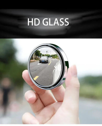 GLOBGRIP HD glass round blind spot mirror showing clear road view in a hand