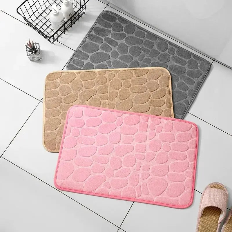 GLOBGRIP anti slip pebble floor mat in pink beige and gray with textured pebble design for bathroom or kitchen