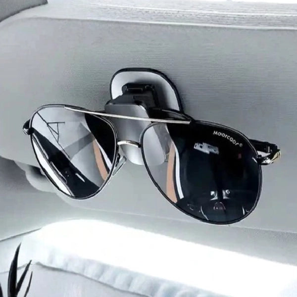 Car visor eyeglass clip.