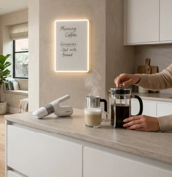 Making coffee in kitchen