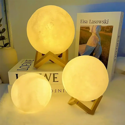 GLOBGRIP Book Light LED Moon Galaxy Night Light with wooden stands illuminated in warm yellow light