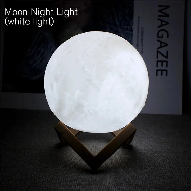 GLOBGRIP Book Light LED Moon Galaxy Night Light glowing with white light on wooden stand