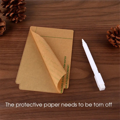 Writeable LED desk lamp accessory showing protective paper and white marker on wooden surface